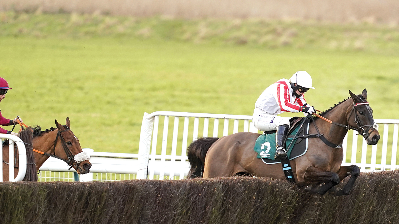 Bridget Andrews riding Latenightpass (right) on their way to winning the Willoughby De Broke Open Hunters' Chase at Warwick Racecourse. Picture date: Wednesday February 3, 2021.