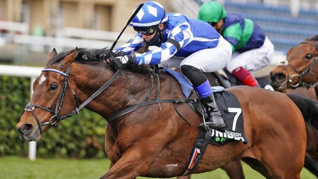 Haqeeqy ridden by Benoit de la Sayette (blue/white) wins The Unibet Lincoln at Doncaster Racecourse.