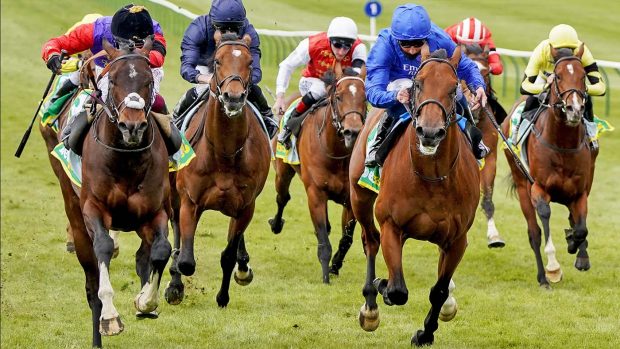 NEWMARKET, ENGLAND - APRIL 14: Oisin Murphy riding Tactical (L) win The bet365 European Free Handicap at Newmarket Racecourse on April 14, 2021 in Newmarket, England. Sporting venues around the UK remain under restrictions due to the Coronavirus Pandemic. Only owners are allowed to attend the meeting but the public must wait until further restrictions are lifted. (Photo by Alan Crowhurst/Getty Images)