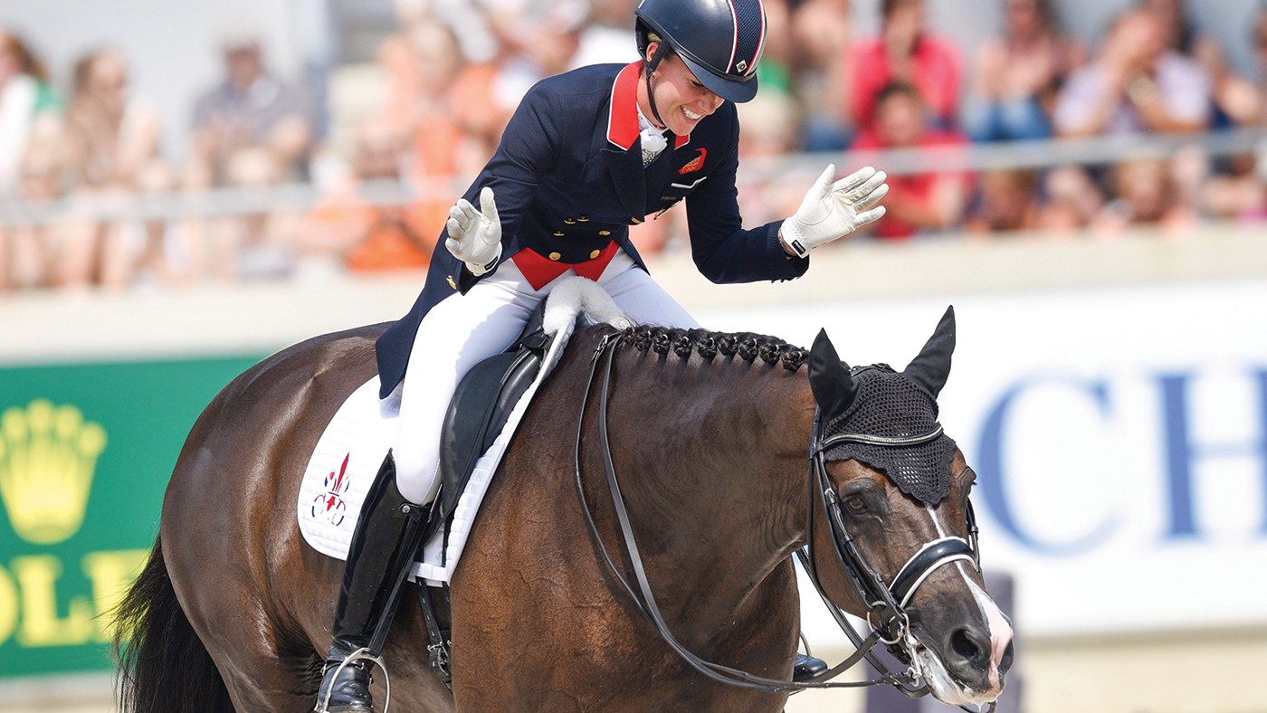 British rider Charlotte Dujardin on horse Valegro reacts during the dressage competition of the CHIO international horse show in Aachen, Germany, 20 July 2014. UWE ANSPACH |