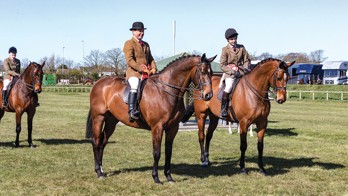 Robert Walker clinches the hunter championship aboard Viewpoint, with son Sam securing the reserve title on middleweight Chief Whip