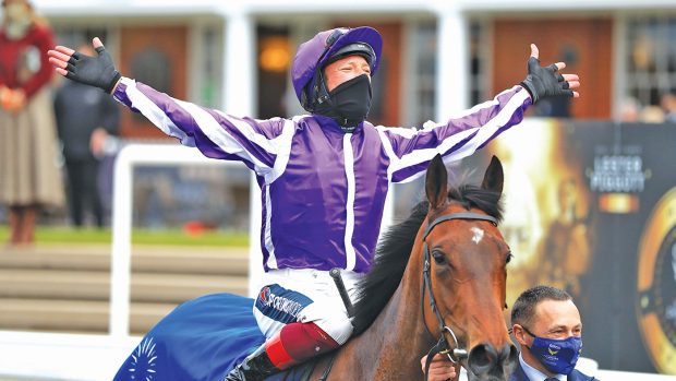 Frankie Dettori celebrates in the winners enclosure after winning the Qipco 1000 Guineas Stakes on Mother Earth during 1000 Guineas Day, part of the QIPCO Guineas Festival at Newmarket Racecourse. Picture date: Sunday May 2, 2021.