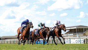 How to watch the Guineas NEWMARKET, ENGLAND - MAY 01: Kevin Manning riding Poetic Flare (R, white) win The Qipco 2000 Guineas Stakes at Newmarket Racecourse on May 01, 2021 in Newmarket, England. Only owners are allowed to attend the meeting but the public must wait until further restrictions are lifted. (Photo by Alan Crowhurst/Getty Images)
