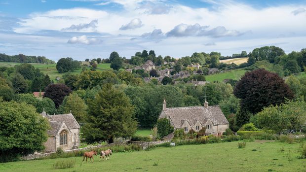 PN10KE Looking across to the cotswold village of North Cerney, Gloucestershire, England