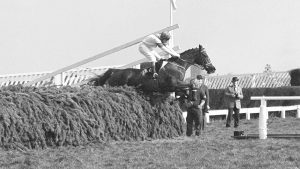 Aldaniti with Bob Champion in the saddle jumps the last fence to go on to win the Grand National Handicap Steeplechase at Aintree, Liverpool.