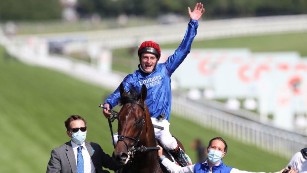 Jockey Adam Kirby celebrates after winning the Cazoo Derby 2021 riding Adayar.