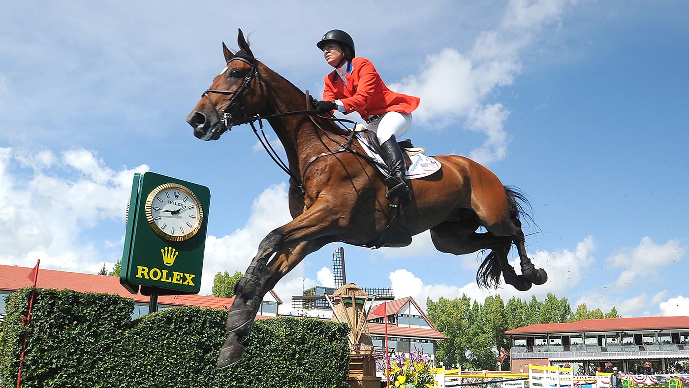 CALGARY, CANADA - SEPTEMBER 08: Beezie Madden of USA riding Simon competes in the individual jumping equestrian on the final day of the Masters tournament at Spruce Meadows on September 8, 2013 in Calgary, Alberta, Canada. Beezie placed 6th with a second round time of 71.27 seconds and 5 faults. (Photo by Derek Leung/Getty Images)