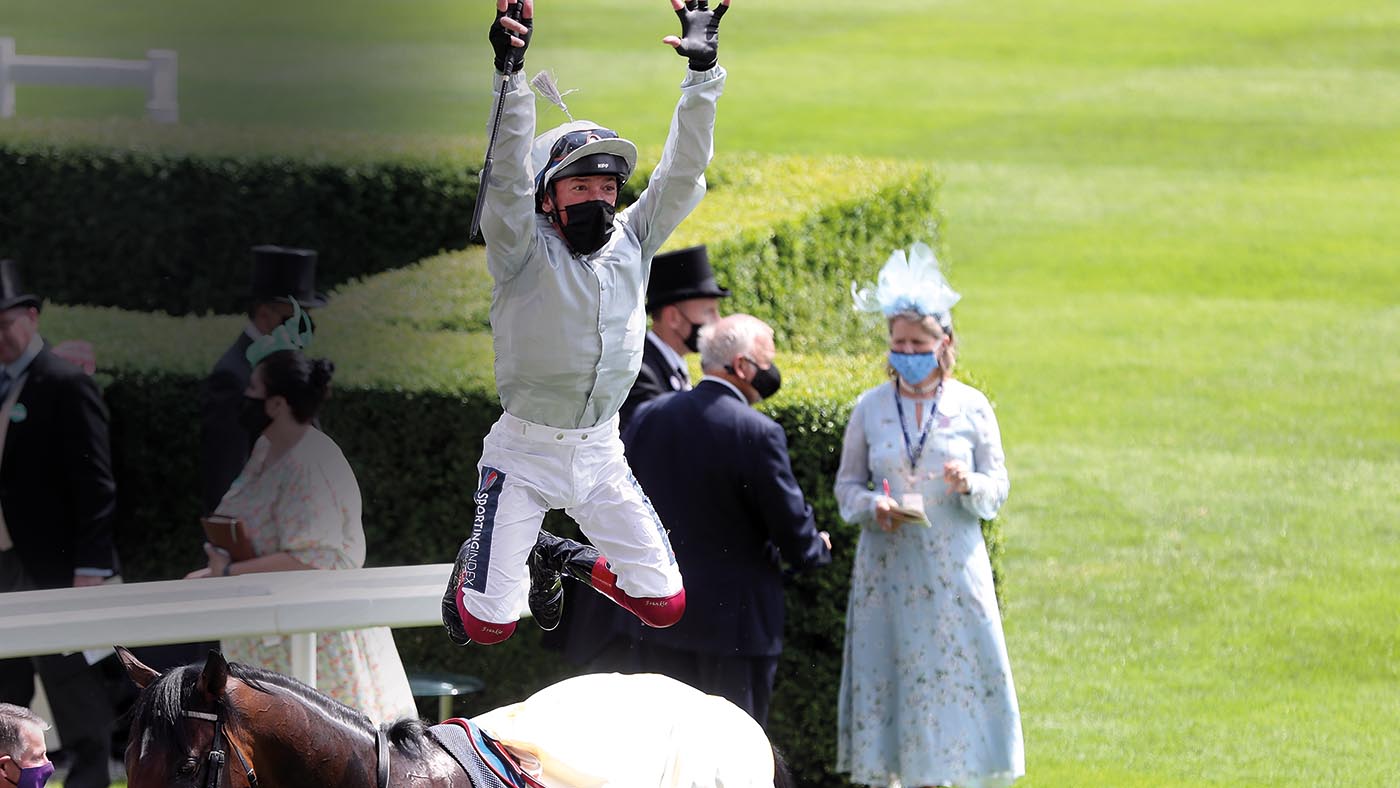 Jockey Frankie Dettori performs his trademark flying dismount as he celebrates winning the Queen Anne Stakes on Palace Pier during day one of Royal Ascot at Ascot Racecourse. Picture date: Tuesday June 15, 2021.