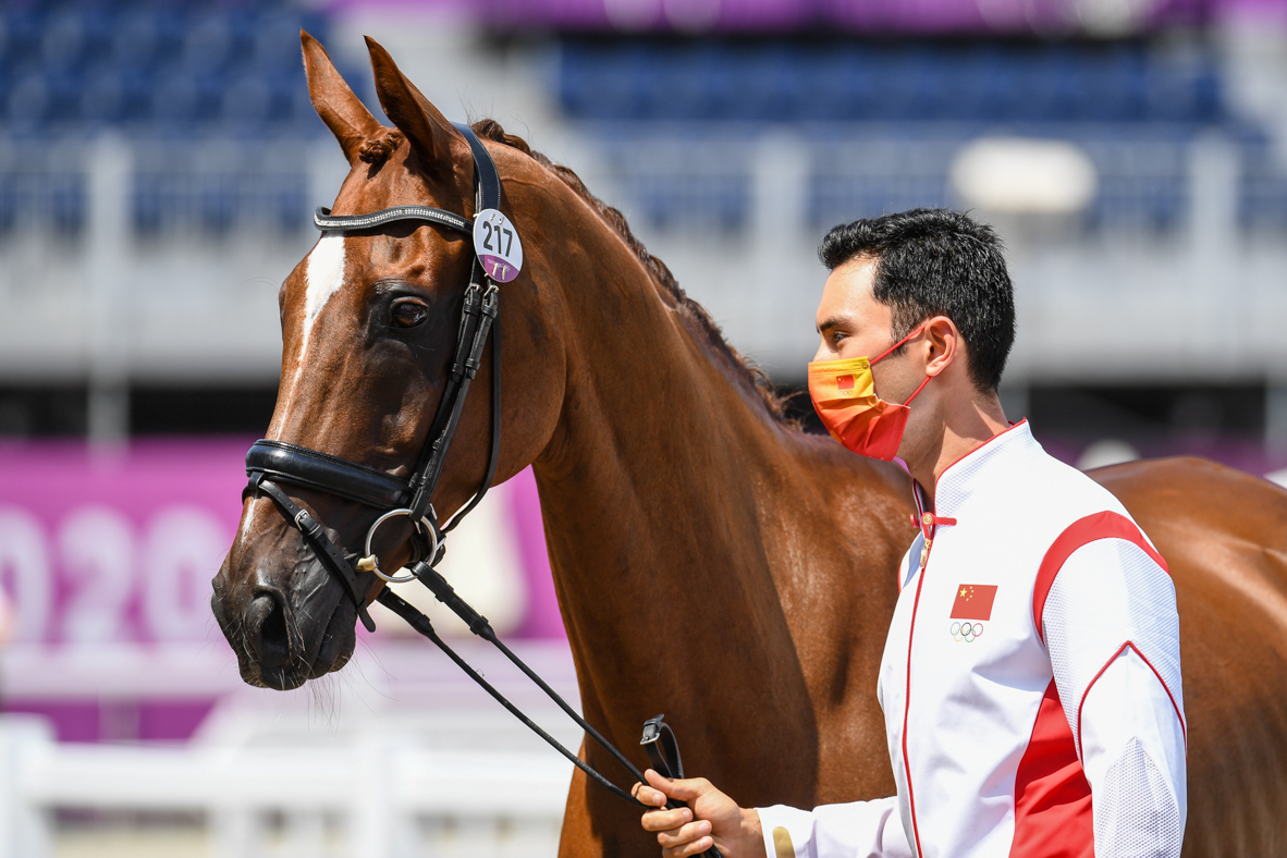 Olympic eventing first trot-up pictures: Alex Hua Tian and Don Geniro