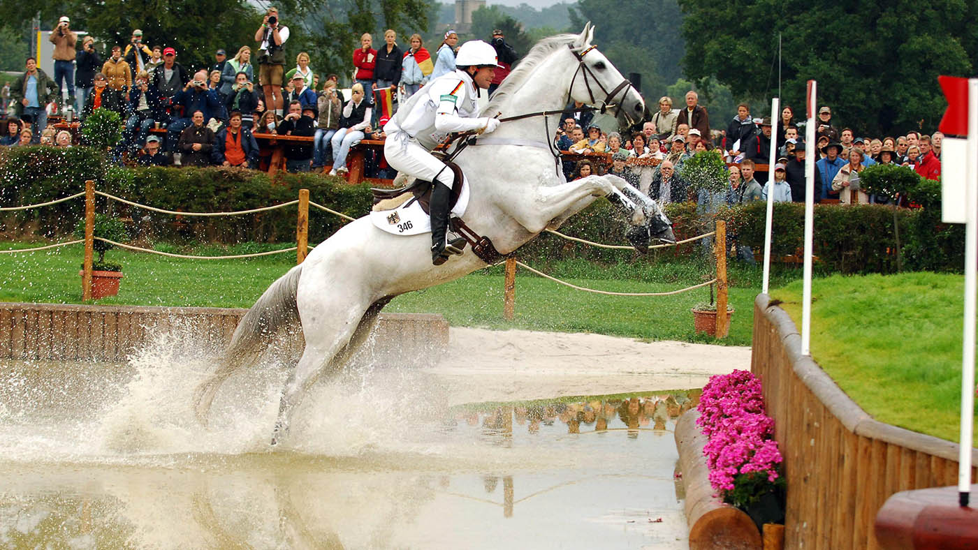 2E9H2JB Germany's Hinrich Romeike on her horse 'Marius Voigt Logistik' during the Cross Country competition of the World Equestrian Games in Aachen, Germany, on August 26, 2006. Photo by Edwin Cook/Cameleon/ABACAPRESS.COM