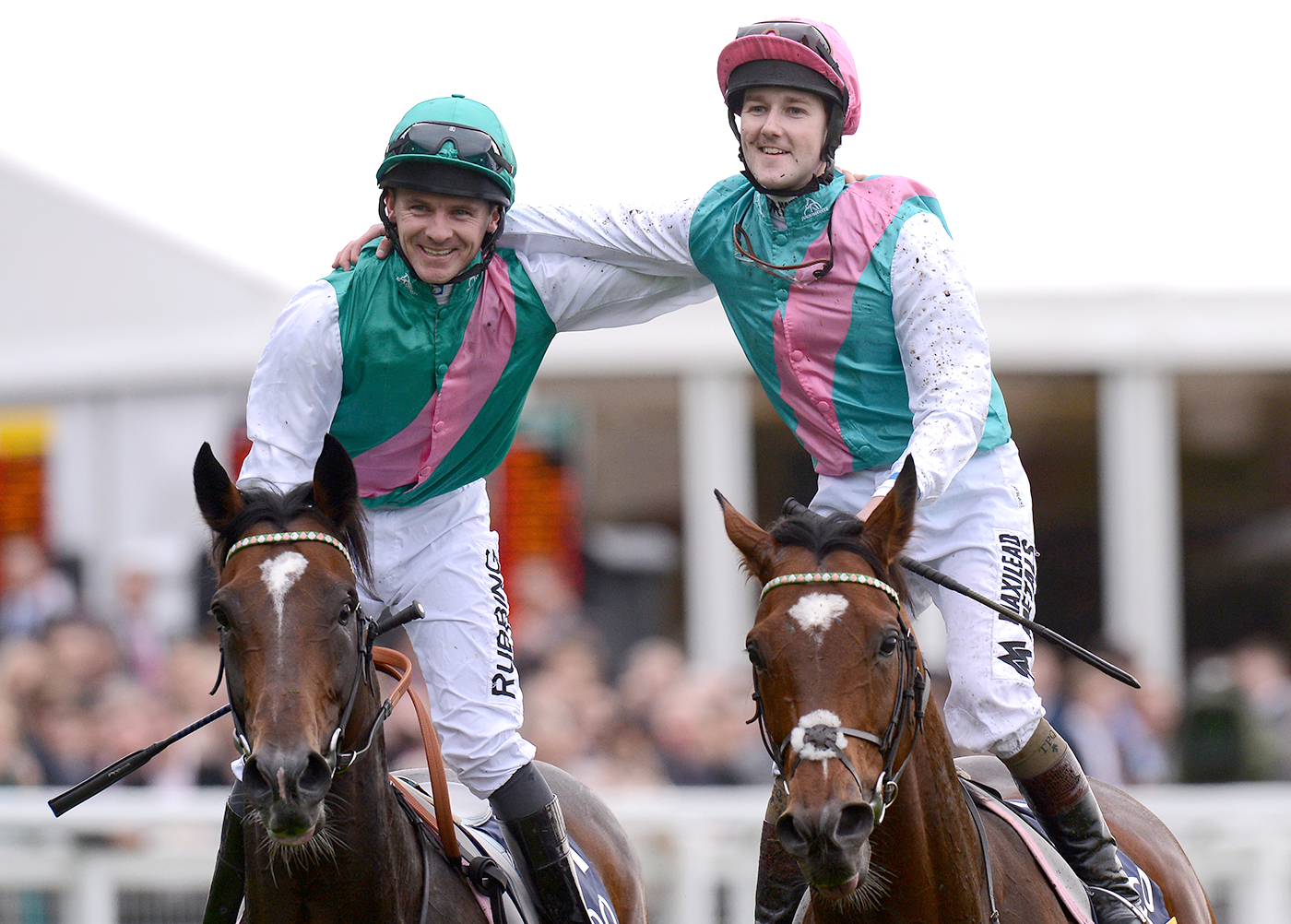 Frankel ridden by Tom Queally (right) embraces Bullet Train ridden by Ian Mongan after winning the Qipco Champion Stakes