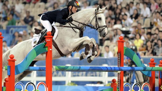 German rider Hinrich Romeike and his horse Marius clear a fence to win two gold medals in the Olympic eventing competition at the Beijing 2008 Olympic Games in Hong Kong.