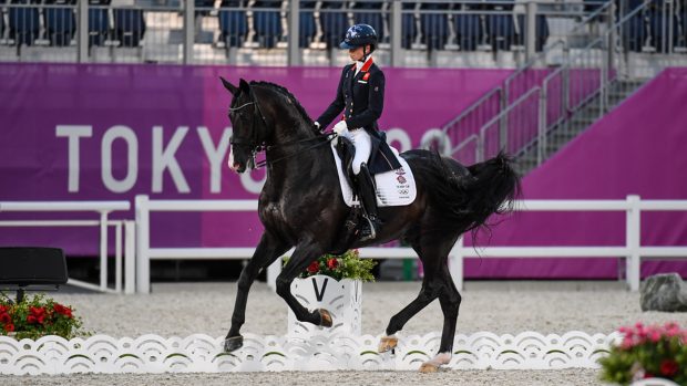 Britain's Lottie Fry rides Everdale in the grand prix at the Tokyo Olympic dressage
