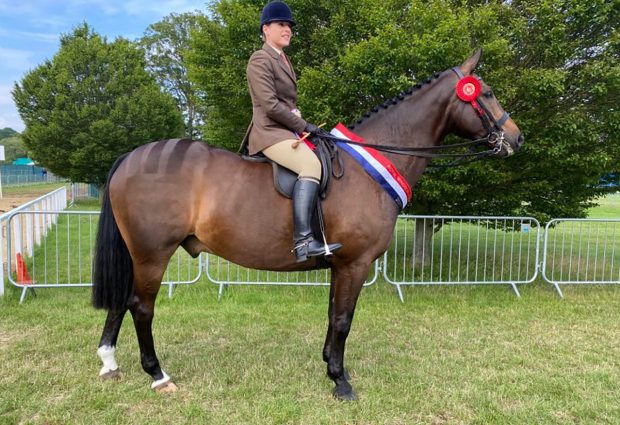 Lucy Lockwood and her own Chantilly Bojangles clinch the amateur hunter title at the 2021 Royal Windsor Horse Show