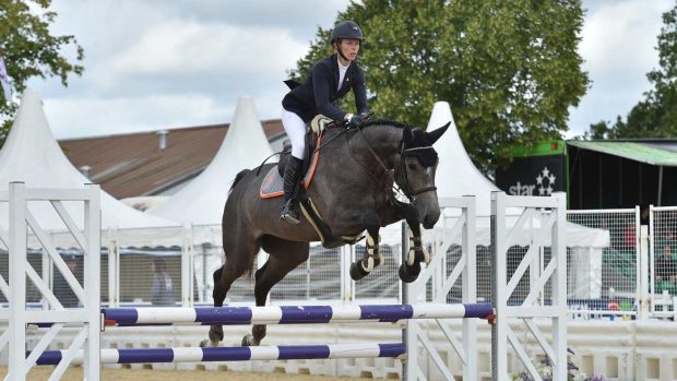 Jessica Botham and Clayton win the national four-year-old final at the British Showjumping national championships