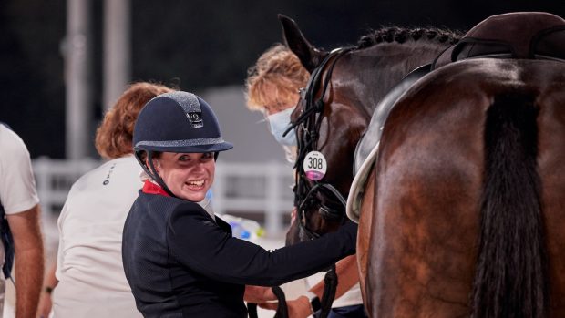 Natasha Baker looks delighted after her grade III individual test in the Paralympic dressage in Tokyo