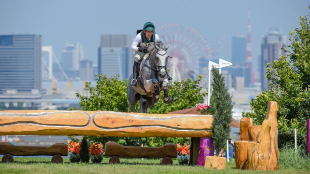 Austen O’Connor riding Colorado Blue for Ireland jumps clear inside the time around the Olympic eventing cross-country at the Tokyo Games