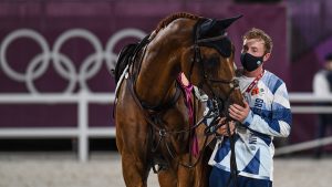 Groom Cormac Kenny with Explosion W at the Tokyo Olympics