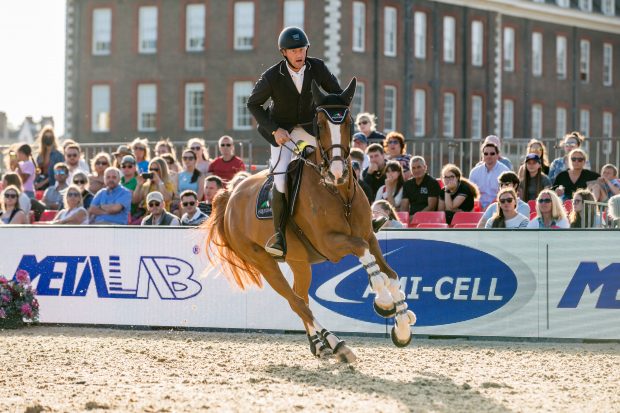 Niels Bruynseels and Ilusionata Van't Meulenhof jumping to third place in the grand prix at the London GCT