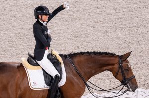 Belgium’s Michele George celebrates her super score in the individual grade V competition at the Tokyo Paralympics