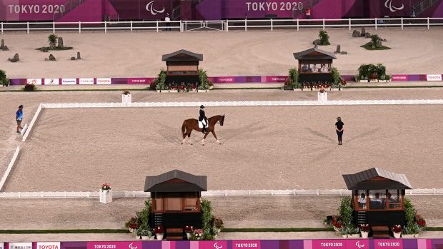 Katja Karjalainen and Dr Doolittle make their entrance into the arena for their final Paralympic dressage competition