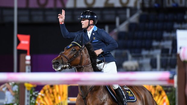 Peder Fredricson riding All In celebrates after his round in the Olympic team showjumping final at the Tokyo 2020 Olympic Games
