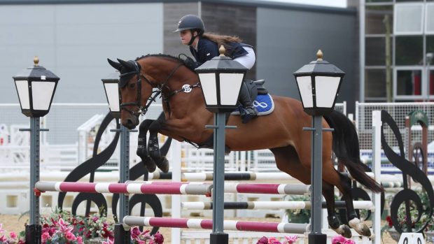 Olivia Sponer and Conella II win the pony discovery championship final the the British Showjumping national championships 2021