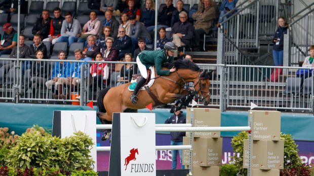 Michael Duffy and Zilton SL Z in round one of the European Showjumping Championships