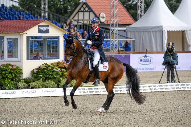 Gareth Hughes and Sinatano van Hof Olympia competing at Hagen in the European dressage championships grand prix