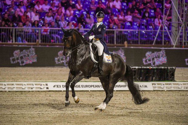 Buriel K.H competing at the 2021 European Dressage Championships with Juliette Ramel