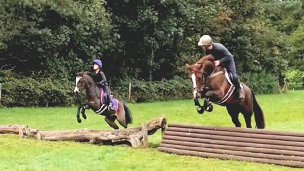 Robert Whitaker and daughter Evie go cross-country