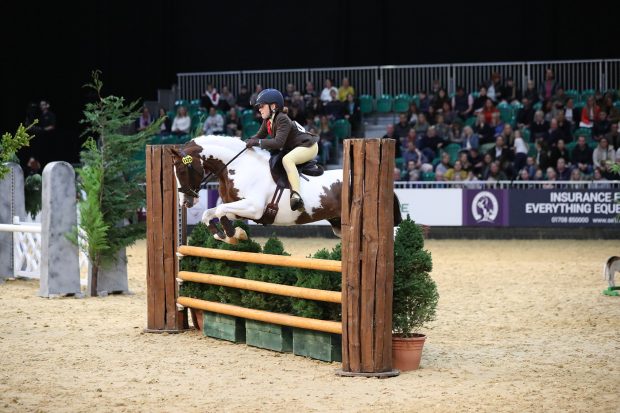 Captain Foley and Florence Drewitt jump to the 133cm working hunter pony title at HOYS