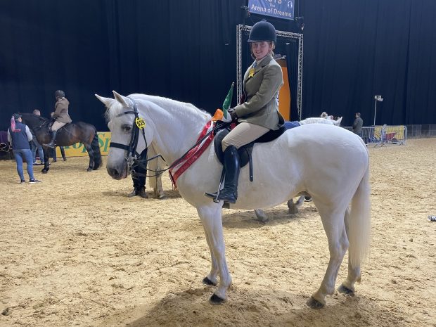 Alicia Devlin Byrne and Blackwood Fernando won the M&M working hunter exc 143cm final at HOYS 2021