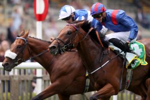 Dubai Honour ridden by jockey James Doyle (right) on their way to winning the bet365 Handicap ahead of Foxes Tales and Silvestre De Sousa (left) during Gentlemen's Day of the 2021 Moet and Chandon July Festival at Newmarket racecourse. Picture date: Friday July 9, 2021.