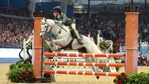 Lily Attwood competing in the mini major at London Horse Show, Olympia, in 2014