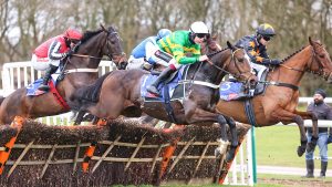 Jonbon Ridden by Aidan Coleman (Green and Gold White Cap) wins at Haydock 22/1/22 Photograph by Grossick Racing Photography 0771 046 1723