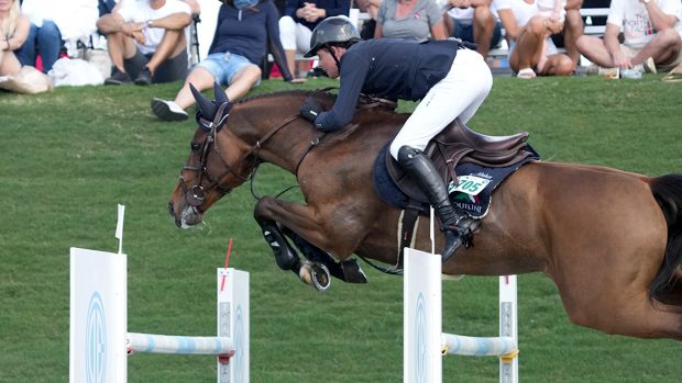 Ben Maher and Faltic HB jumping to the runner-up spot in the CSI3* grand prix at WEF