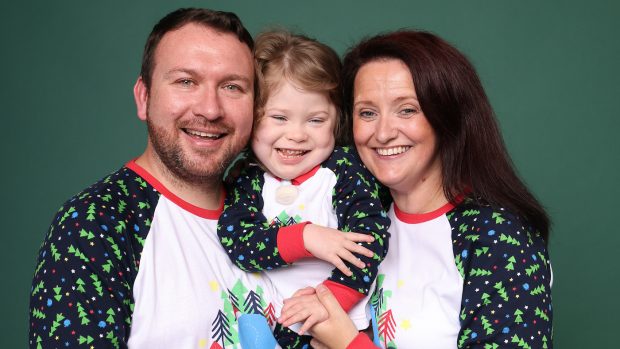 Betty Batt, pictured with her parents, Phil and Karen, has been named the honorary 41st runner in the 2022 Randox Grand National