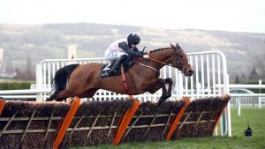 Bob Olinger CHELTENHAM, ENGLAND - MARCH 17: Bob Olinger ridden by Rachael Blackmore on their way to winning the Ballymore Novices' Hurdle on day two of the Cheltenham Festival at Cheltenham Racecourse on March 17, 2021 in Cheltenham, England. Sporting venues around the UK remain under strict restrictions due to the Coronavirus Pandemic as Government social distancing laws prohibit spectators inside venues resulting in events being held behind closed doors. (Photo by Tim Goode - Pool/Getty Images)