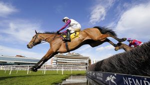 Bravemansgame Cobden riding Bravemansgame clear the water jump on their way to winning The Betfair Cheltenham Roarcast Novices' Limited Handicap Chaseat Newbury Racecourse on February 12, 2022 in Newbury, England. (Photo by Alan Crowhurst/Getty Images)
