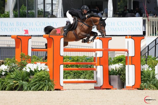 Isabella Russekoff and Balou's Fly High jumping to victory at the Winter Equestrian Festival