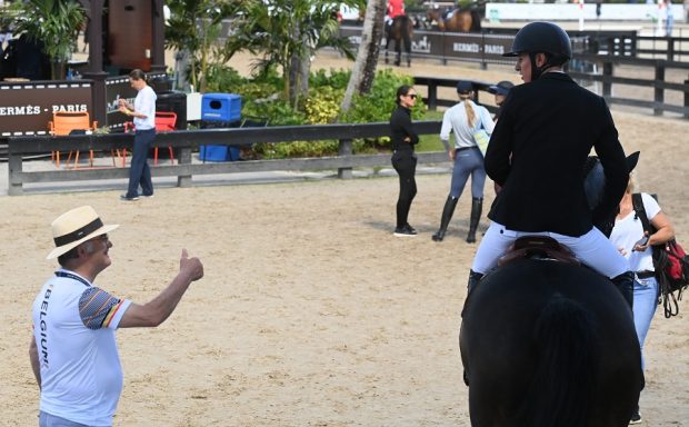 Belgium chef d'equipe Peter Weinberg greets Jos after winning round