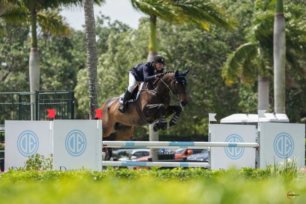 McLain Ward and Noche De Ronda jumping to victory on the Stadium Derby Field