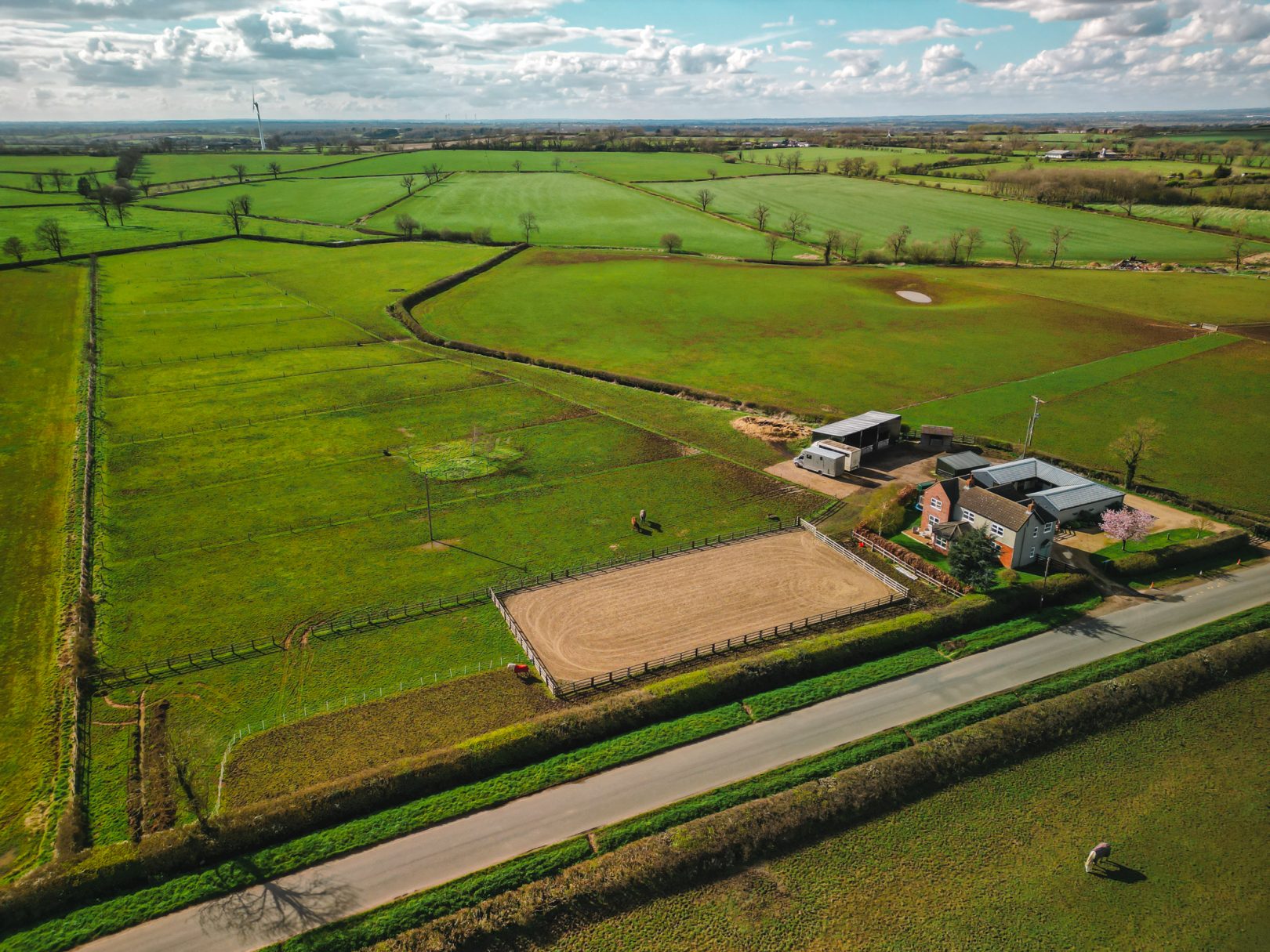 Check out this idyllic rural home with five acres, arena and five