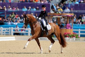 G5BJHC Great Britain's Laura Bechtolsheimer riding Mistral Hojris compete during the Team and Individual Dressage Grand Prix at Greenwich Park, on the sixth day of the London 2012 Olympics.