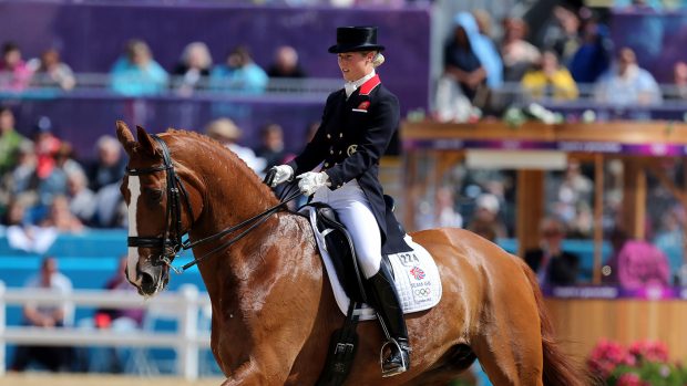 G5BJHC Great Britain's Laura Bechtolsheimer riding Mistral Hojris compete during the Team and Individual Dressage Grand Prix at Greenwich Park, on the sixth day of the London 2012 Olympics.