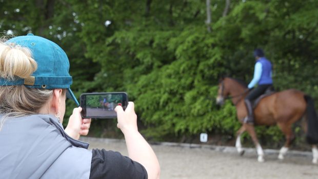 cheap ways to improve horse riding skills: videoing lessons