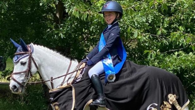 Young showjumper Annabel Widdowson pictured on pony Another Victory following their win at Hickstead