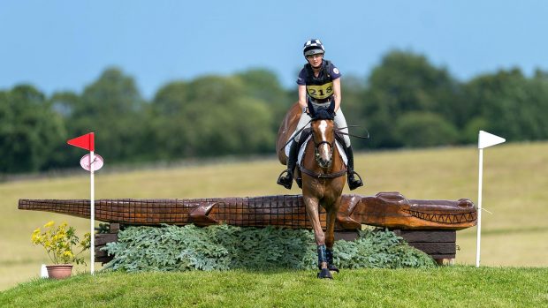 A rider tackles the cross-country course at Burgie Horse Trials
