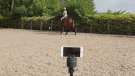Pivo+ recording a horse and rider in canter